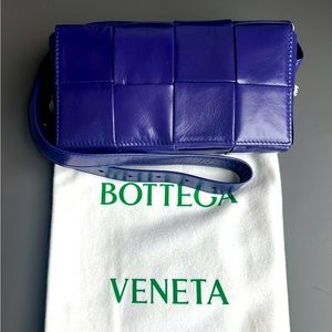 Brand new Originally $2,100 purple color and fits comfortably as a crossbody.